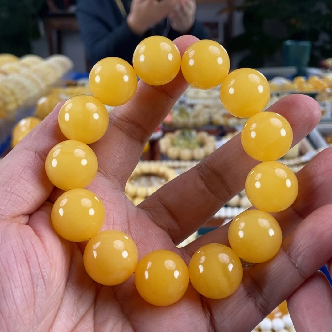 琥珀未镶嵌珠宝奇石18鸡油红浓蜡同料手串45.18