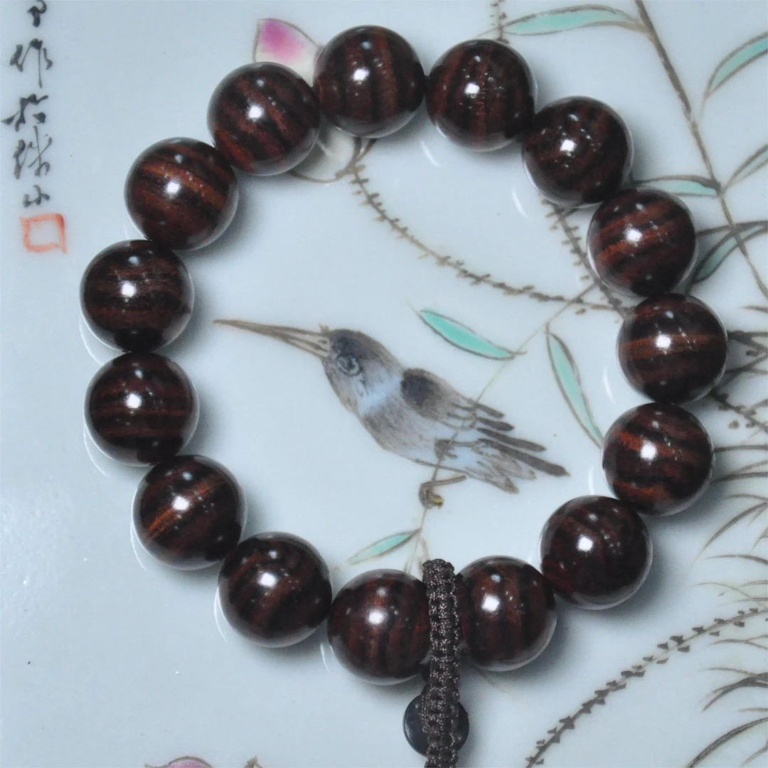 海南黄花梨海黄1.5CM红油梨满花纹手串文玩（多样性发货）A2