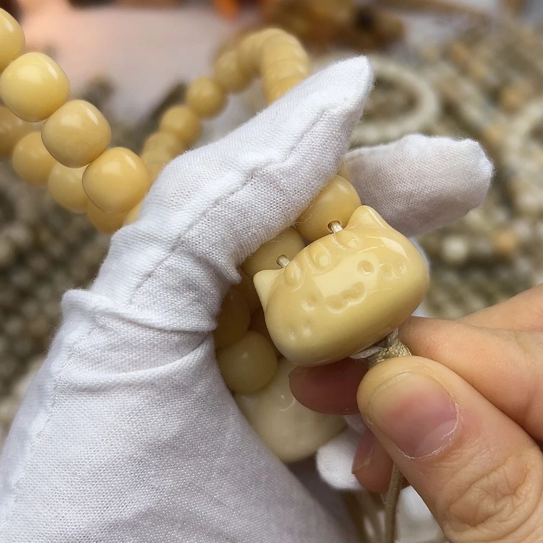 吊坠菩提根/象牙果28法棍猫双通发一颗