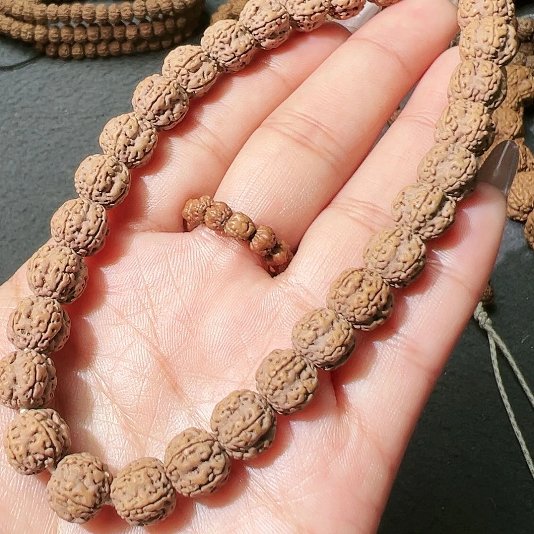 金刚菩提吊坠梅花手串