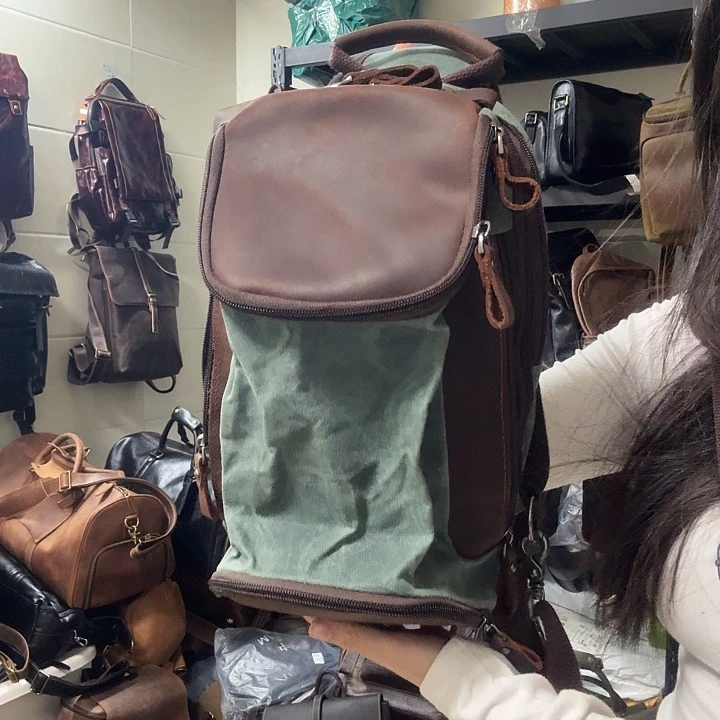 头层牛皮斜挎疯马帆布