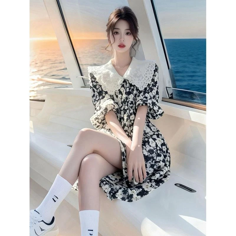 法式甜美风娃娃领碎花连衣裙女2025春夏新款度假绝美收腰显瘦裙子