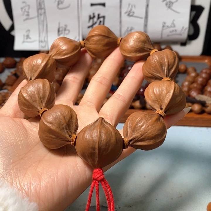 如***潘橄榄核手串0382精品4花老树王蒜头铁核9+1颗