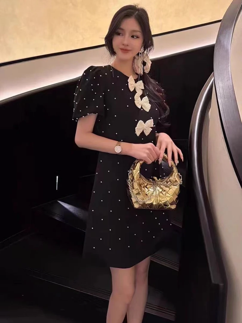 欧货女装2025设计感重工钉珠蝴蝶结时尚减龄显瘦连衣裙