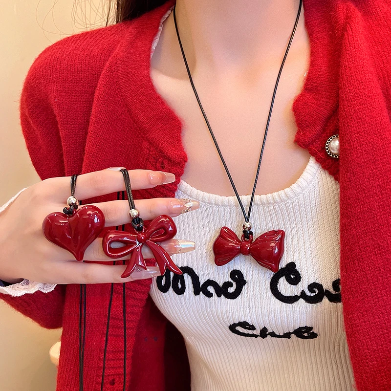 安可拉红蝴蝶结毛衣链秋冬配饰长款项链女小众首饰