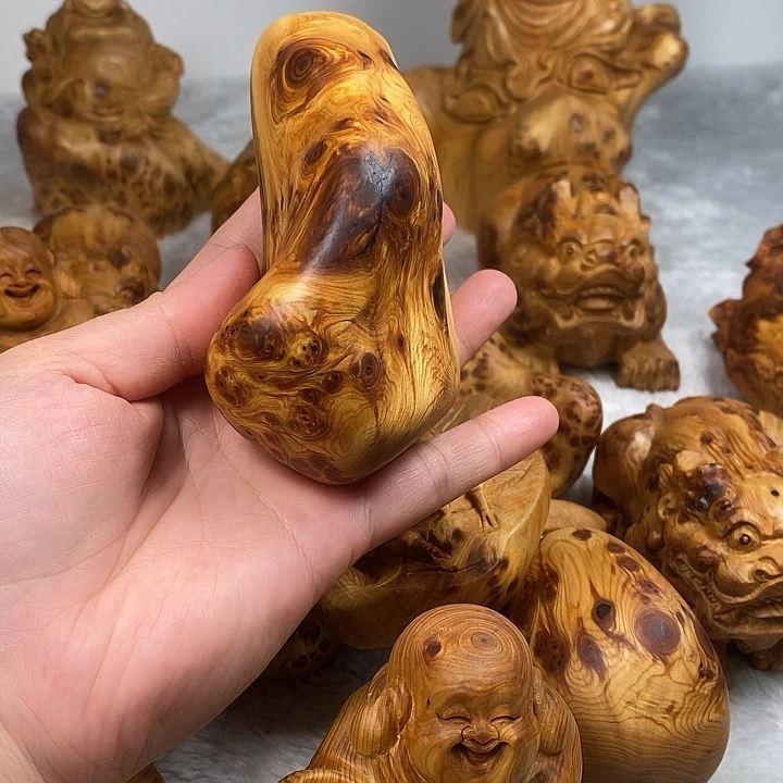 柏木随行瘤疤手把件