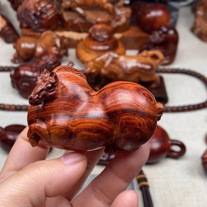 如***翼黄花梨/降香黄檀把件