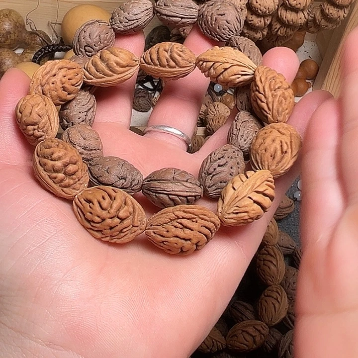 嘿***嘿桃核吊坠正宗桃枭手串