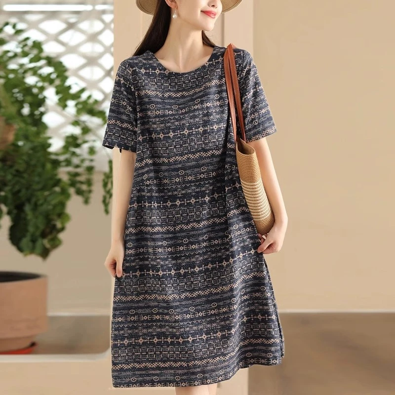 广州十三行高端气质印花休闲棉麻连衣裙2025夏季亚麻圆领短袖长裙