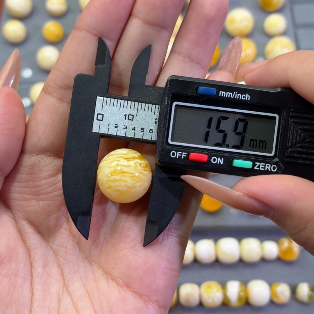 Y***）琥珀未镶嵌裸石圆珠