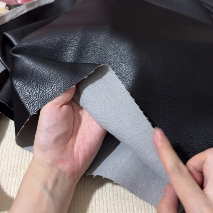 混纺灰底黑皮1米。