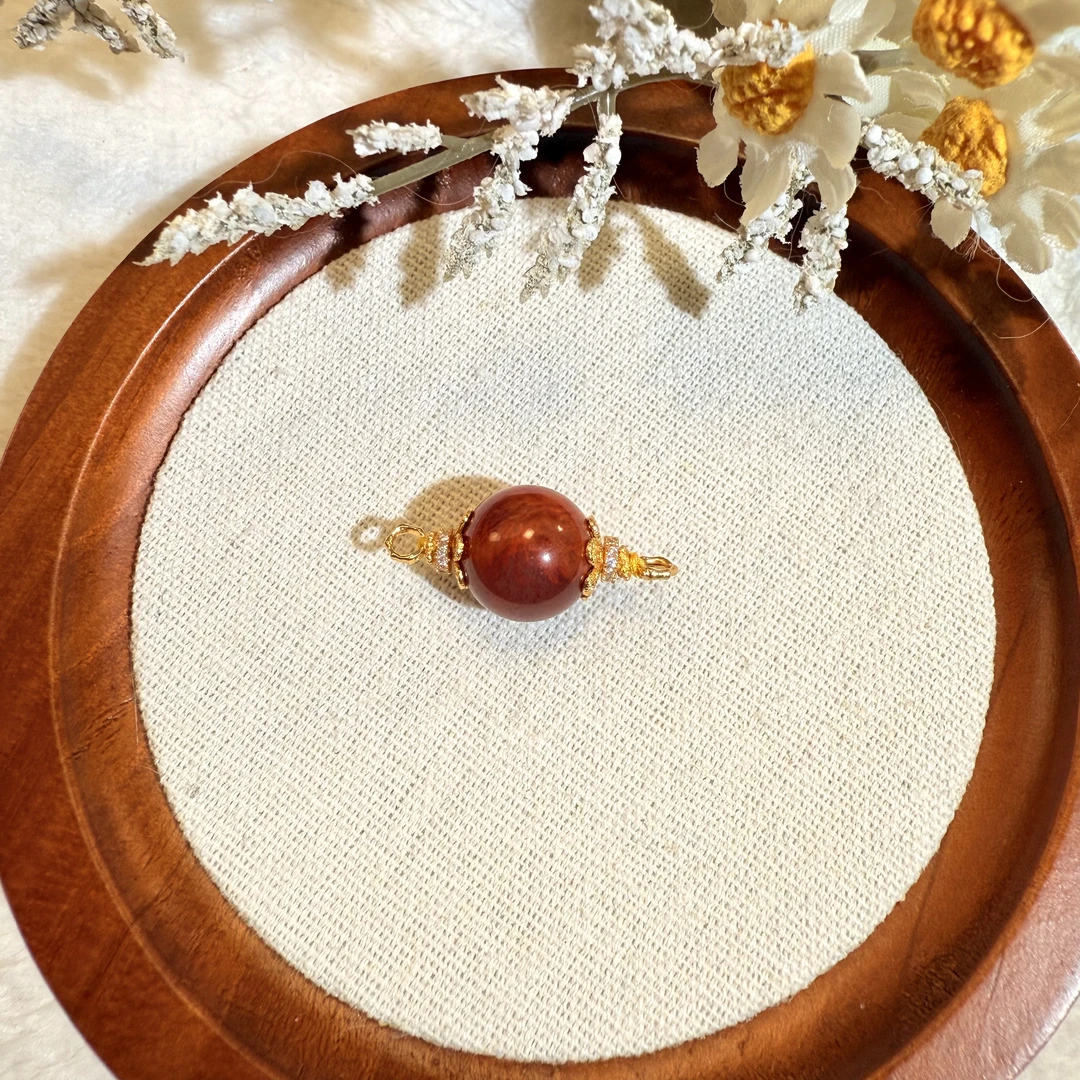 牛血红火焰纹南红单珠吊坠中穿