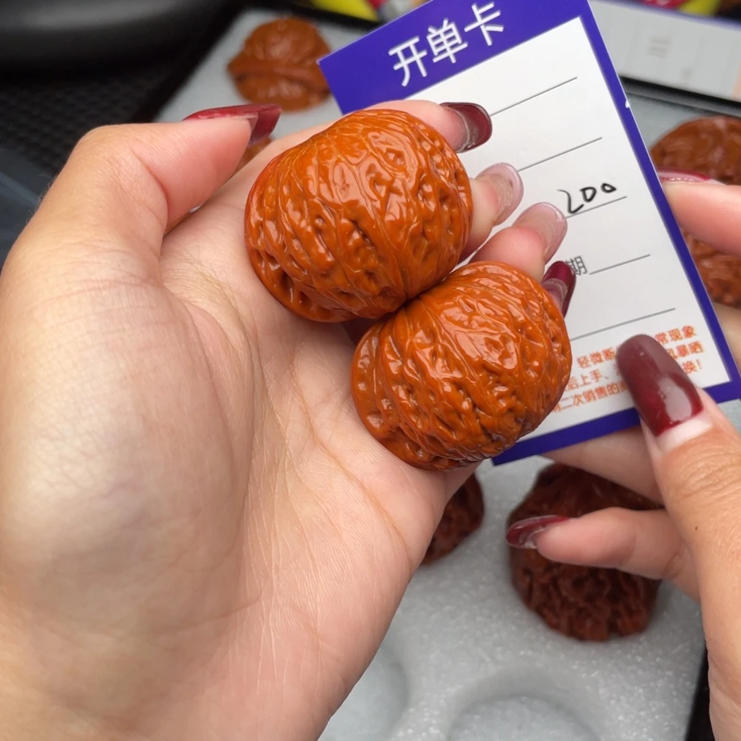 屹***涯桃核把件38铁锤200