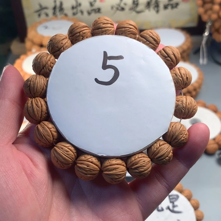 手串桃核宽脐金豆