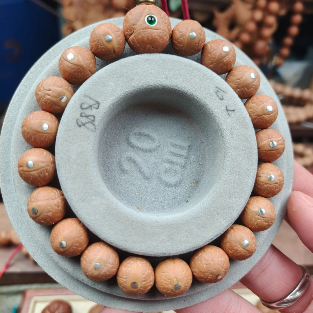 12mm高品质尼泊尔凤眼菩提子手串凤眼菩提镶嵌999纯银银钉款手串