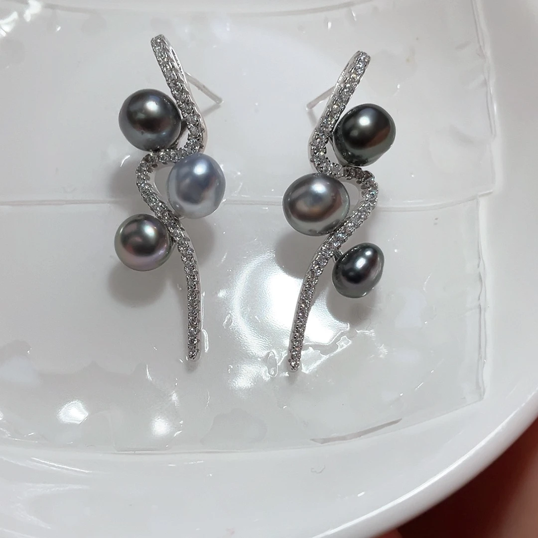 海水珍珠耳饰银S925镶嵌小****?