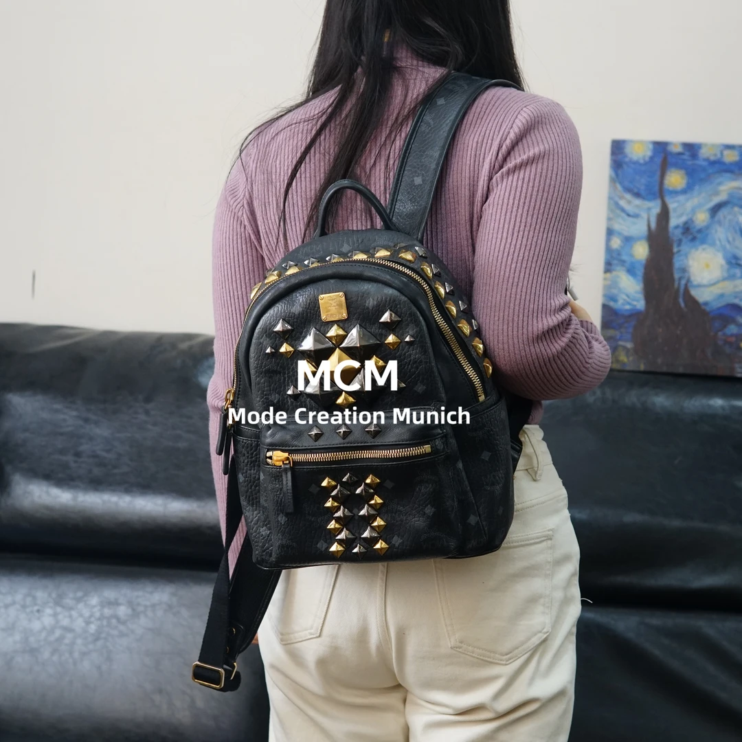 95新 MCM 黑金双肩包/F3XS12727020/7020