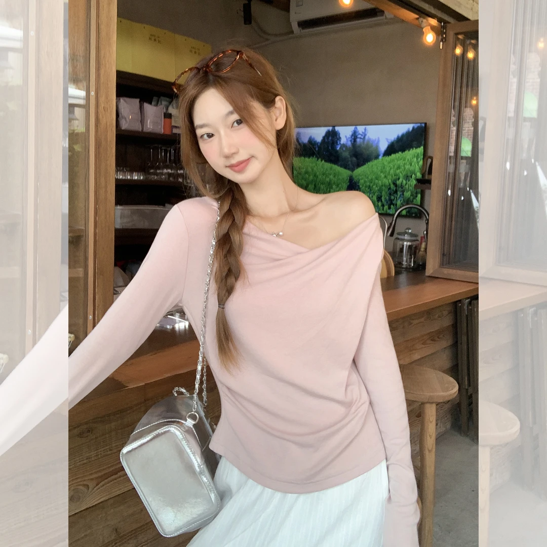 纯欲浅粉色斜肩性感露肩长袖T恤女秋新款内搭修身显瘦设计感上衣