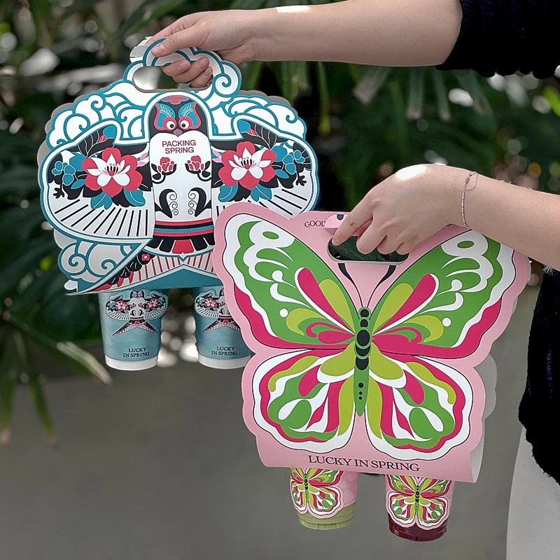 网红爆款咖啡杯子一次性奶茶纸杯冷热饮镂空打包蝴蝶杯提杯套