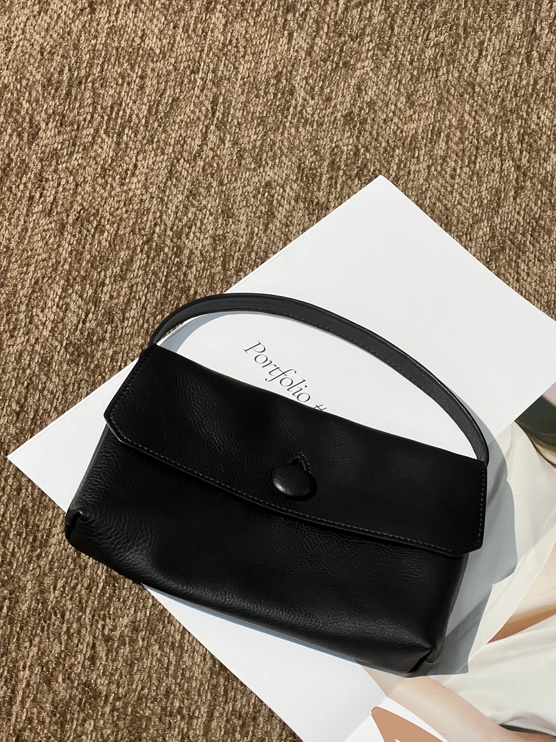 牛皮车缝线小包手拎手提包包