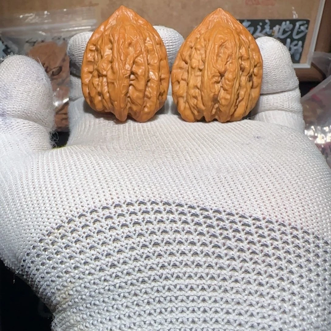 阿***虎文玩核桃把件35全品赤龙鸡心