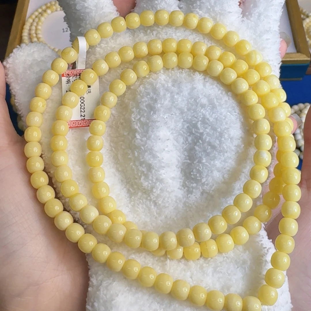 未镶嵌琥珀裸石6.5mm奶黄浓蜡顺色
