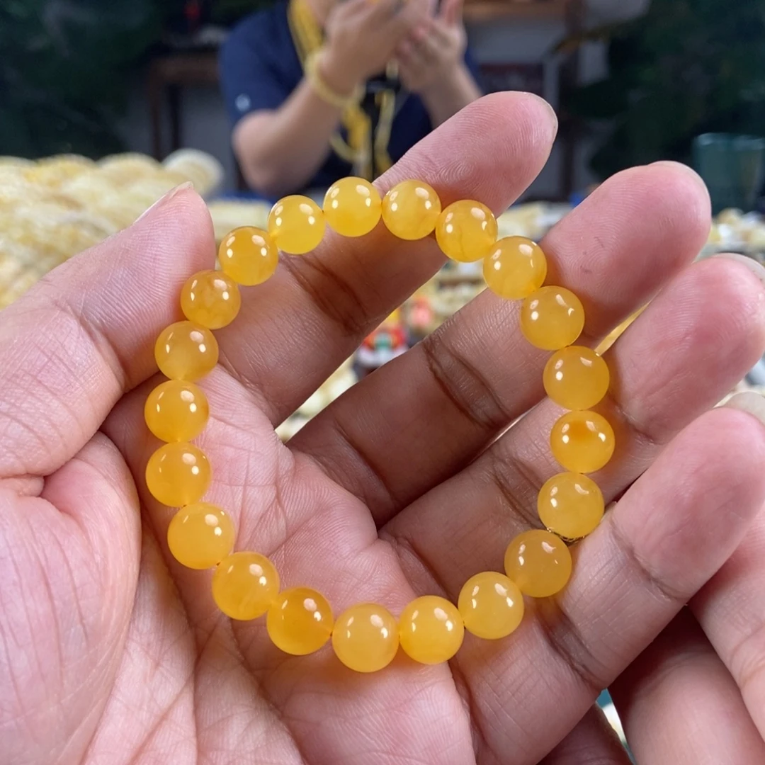 琥珀未镶嵌珠宝奇石9鸡油红蜜蜡手串9.29