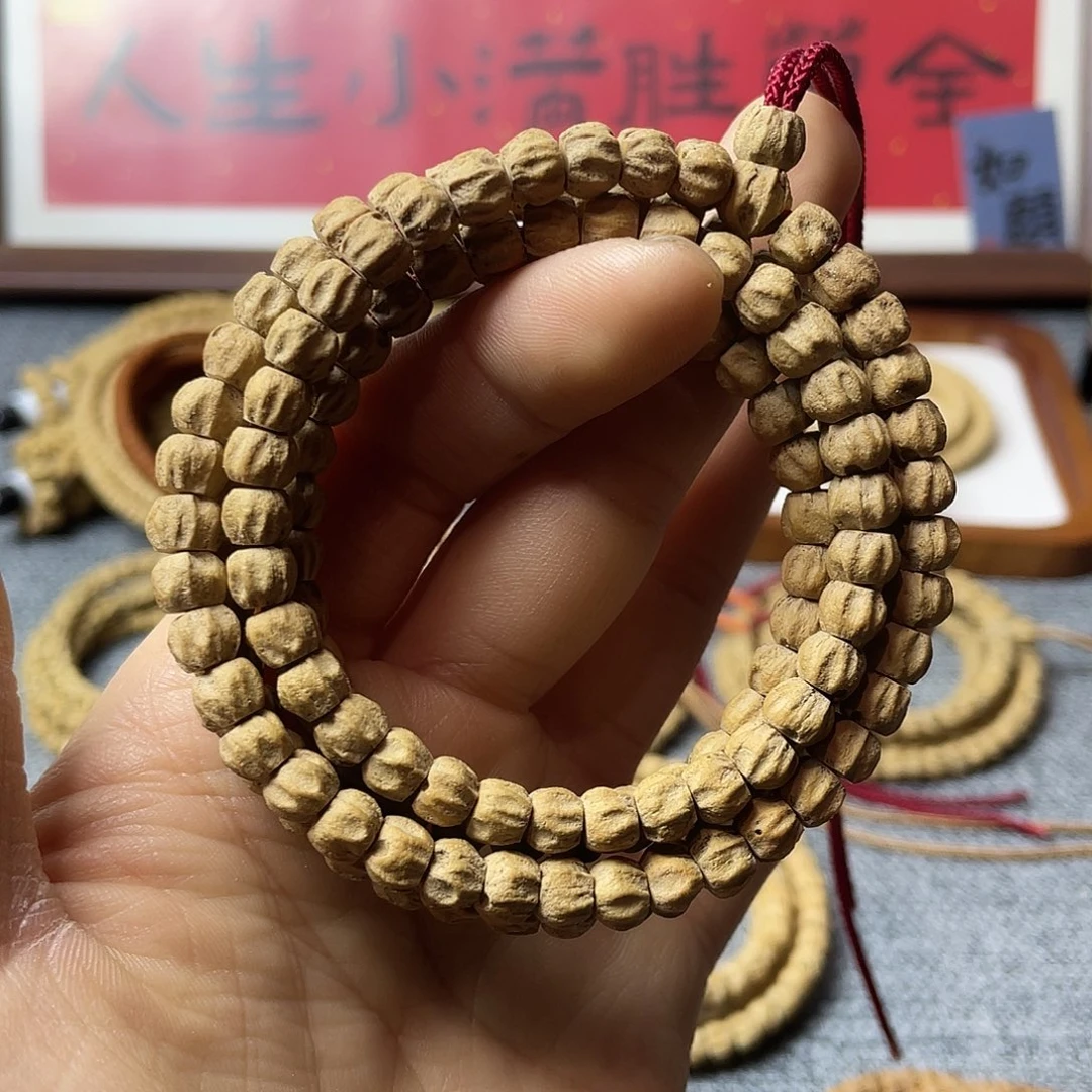 吊坠柏香籽/百香籽红皮莲花方块顺6.5mm