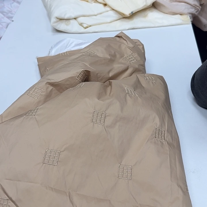 无纺布三米羽绒服面料