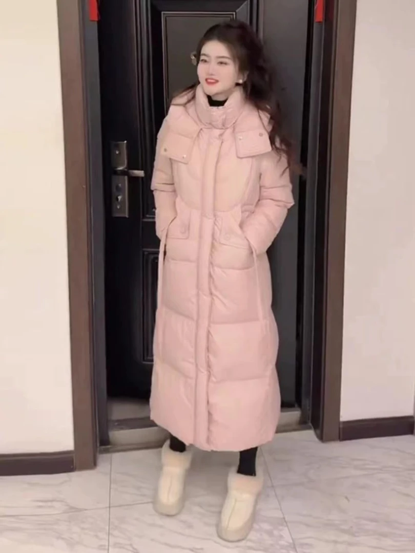 粉色连帽羽绒服女长款过膝2024冬季新款韩版设计感宽松白鸭绒外套