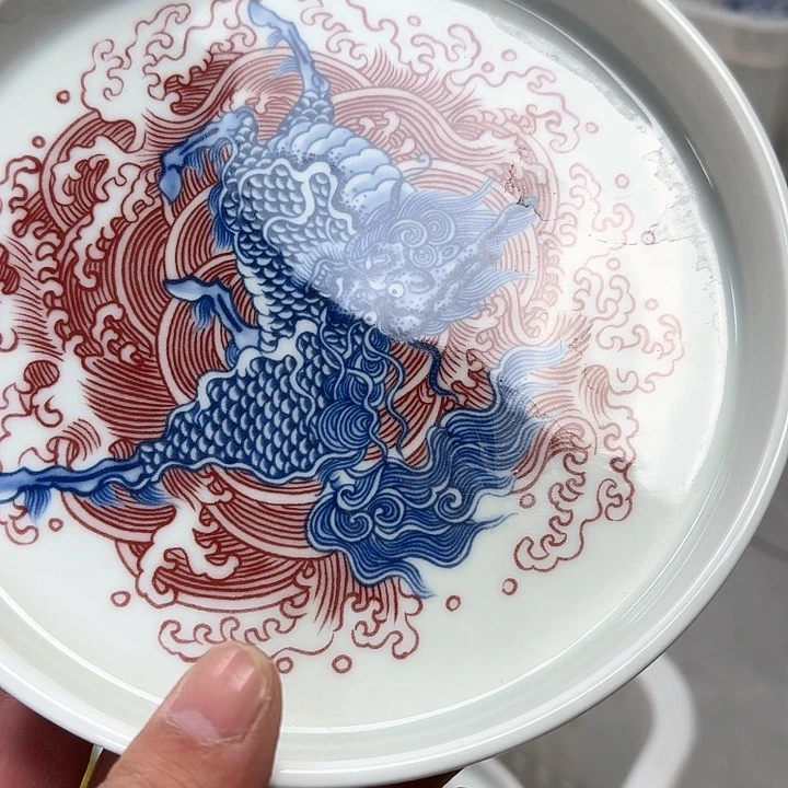 瓷片釉里红麒麟踏浪大壶乘