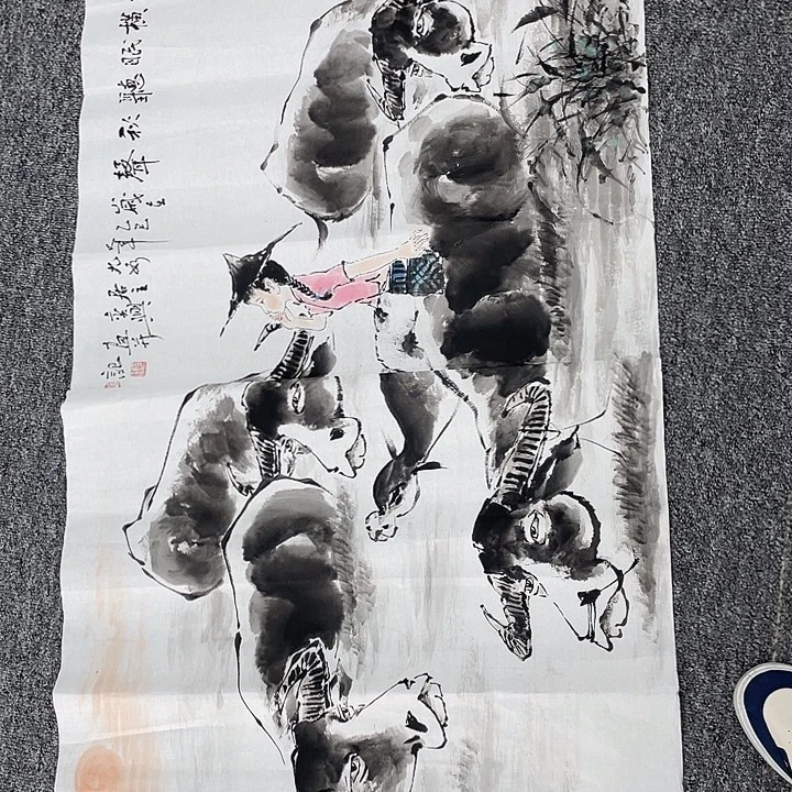 国画卖字画的小男孩