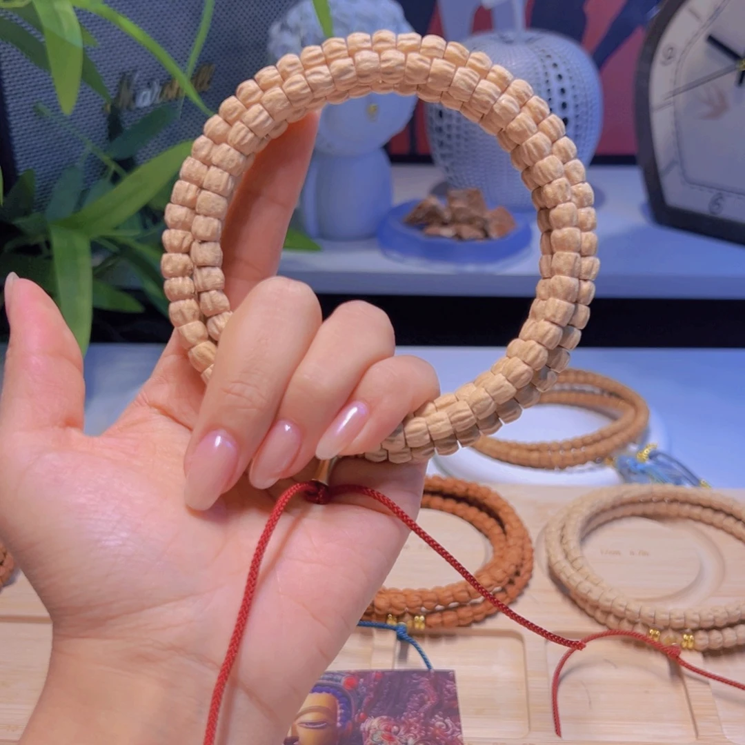 赵***果柏香籽/百香籽吊坠