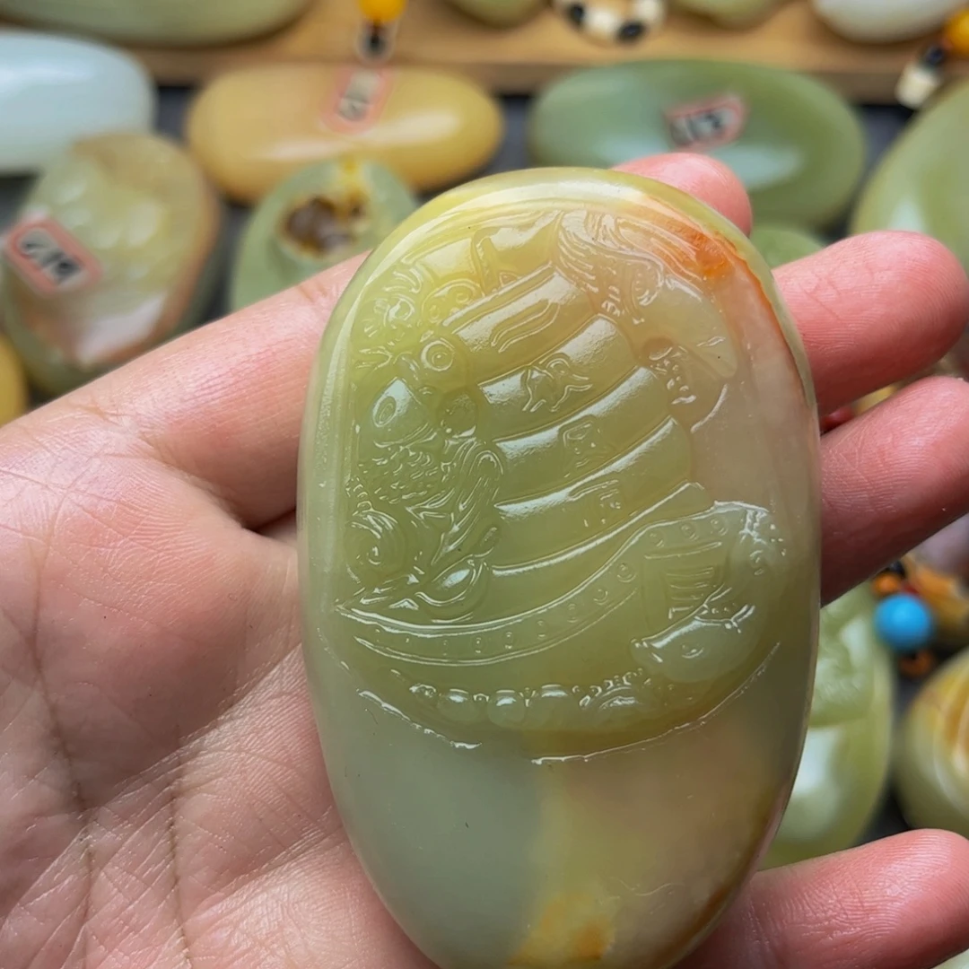 石材方解石手把件一帆风顺