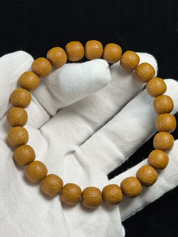 星河·波澜不惊荔枝纹手工雕刻猴头核桃手串