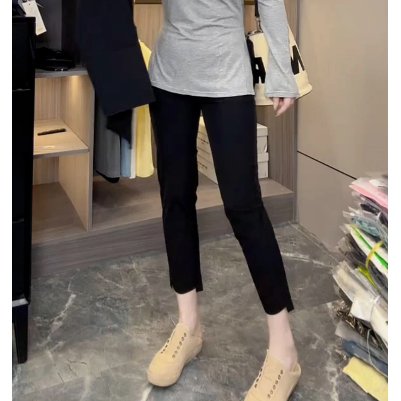 黑色弹力显瘦松紧腰舒适面膜裤女2025夏季薄款胖mm纸皮休闲九分裤