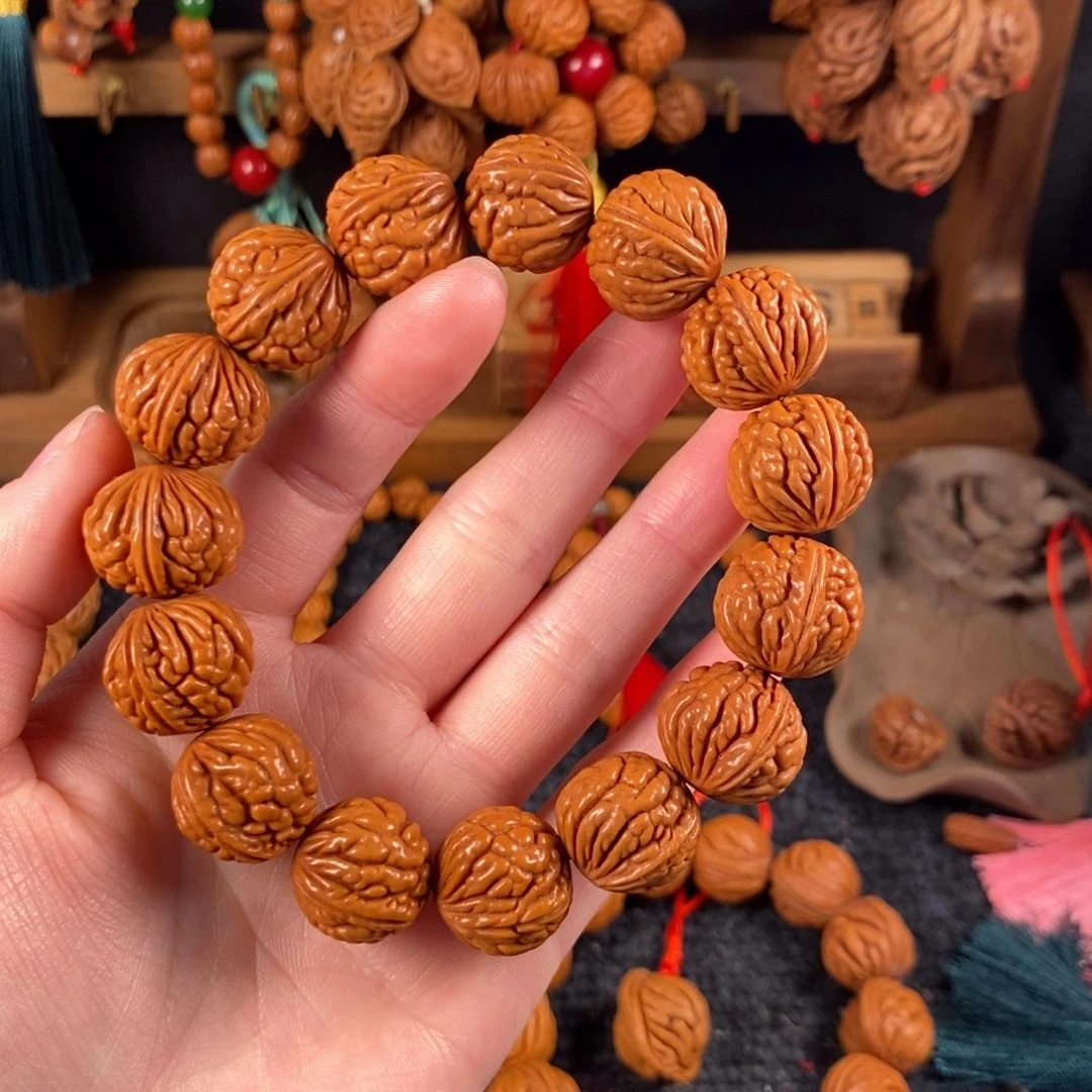 吊坠桃核桃枭手串