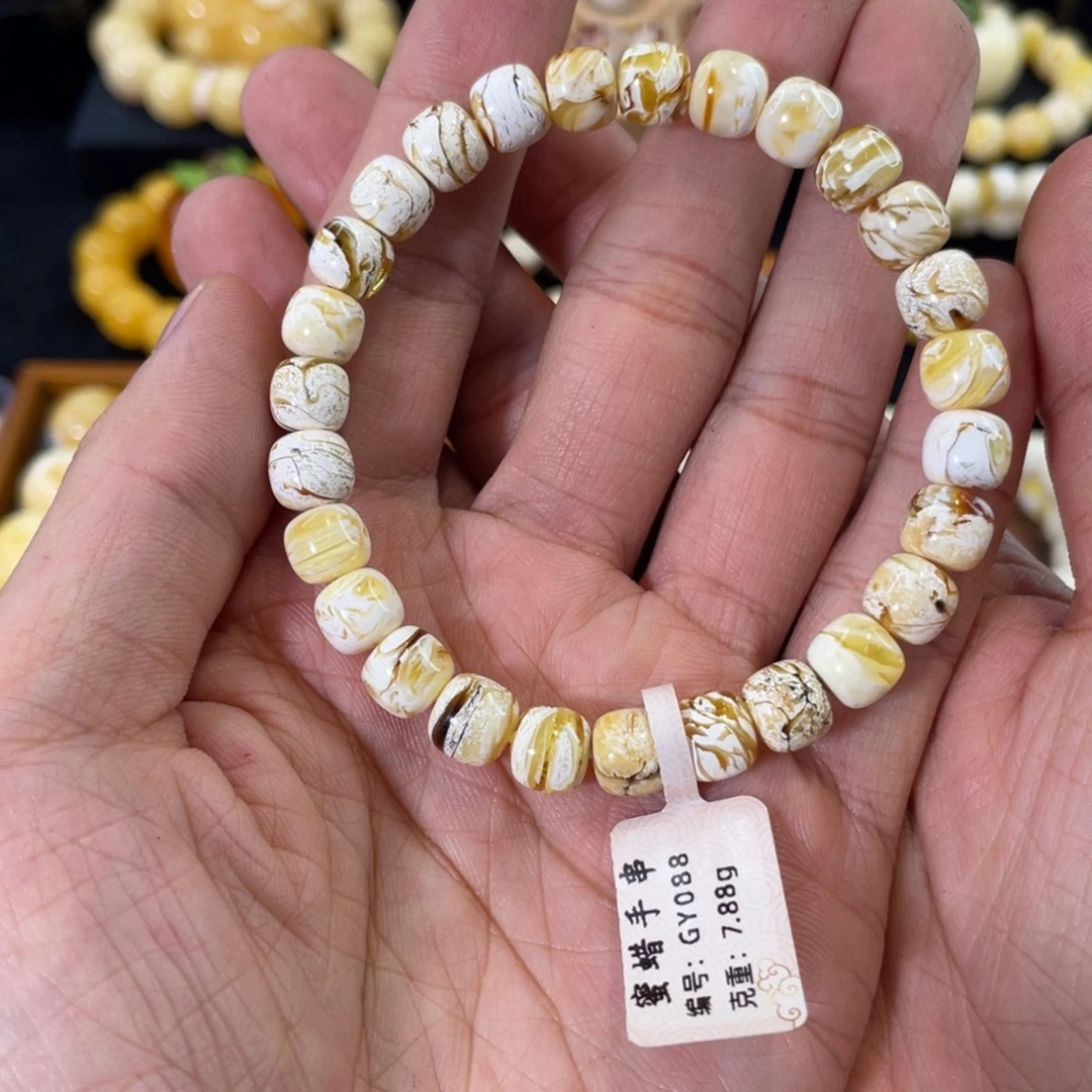 琥珀未镶嵌裸石金瓷白沁色拉丝老型手串