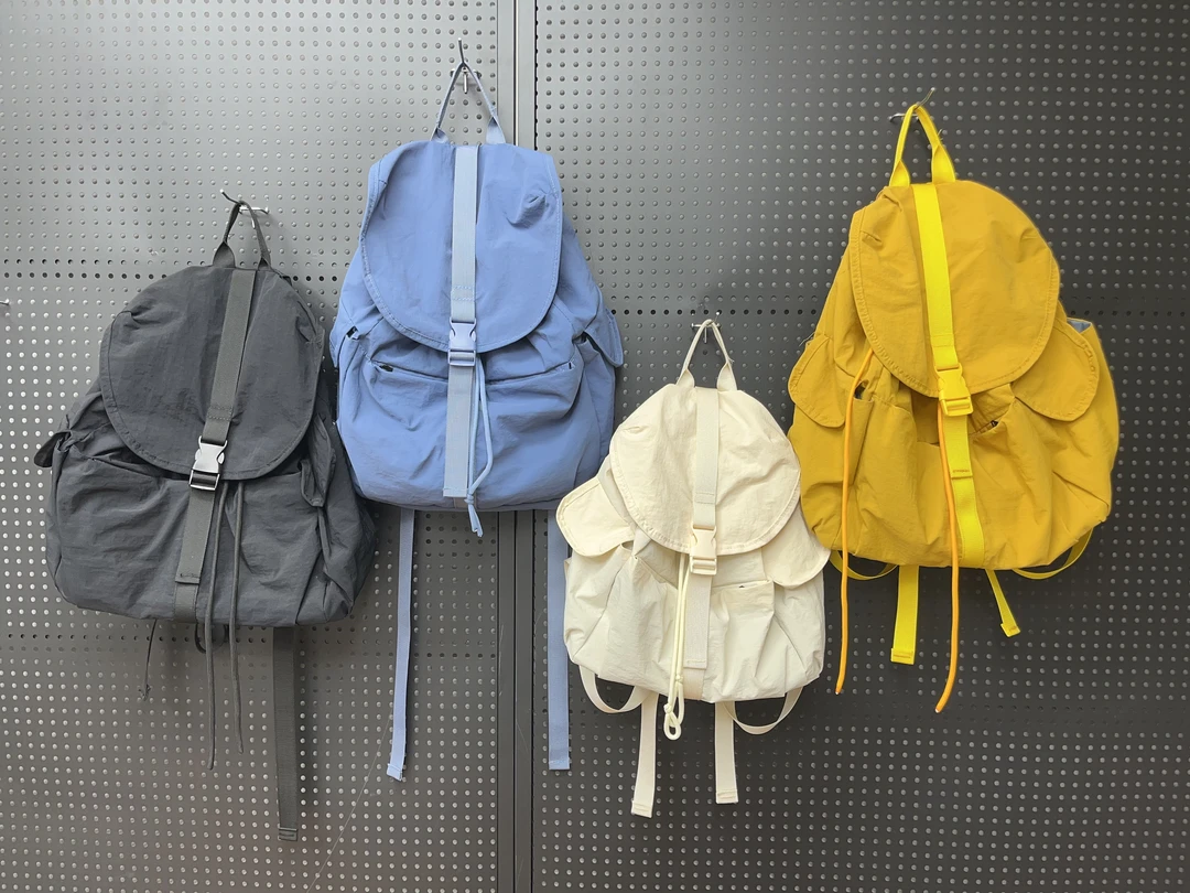 旅行包日系女生双肩包布包休闲男士双肩包潮流初中欧美时尚包盖式