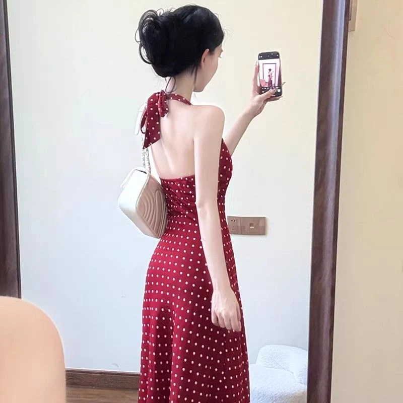 法式纯欲红色波点V领挂脖连衣裙夏季新款设计感露背无袖背心长裙