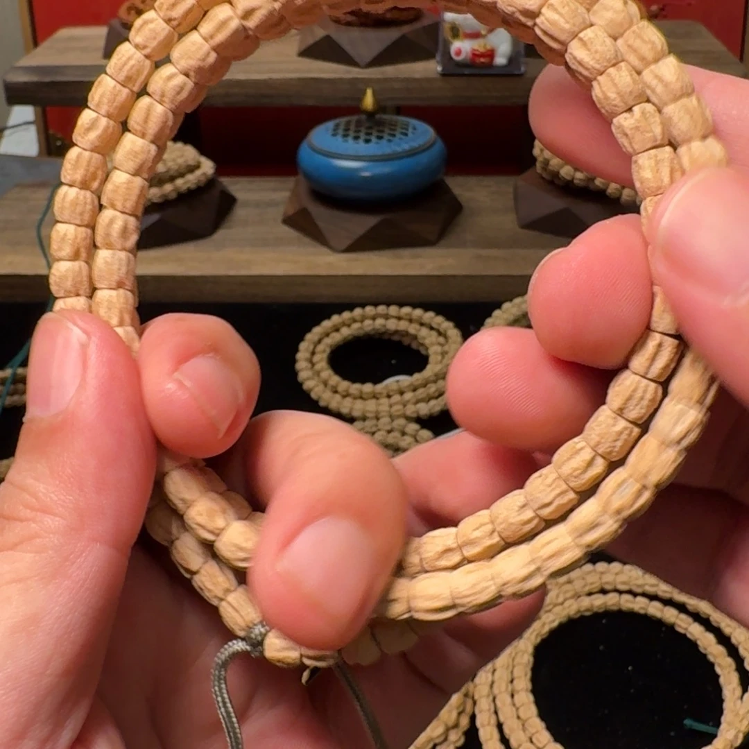 柏香籽/百香籽吊坠八**?