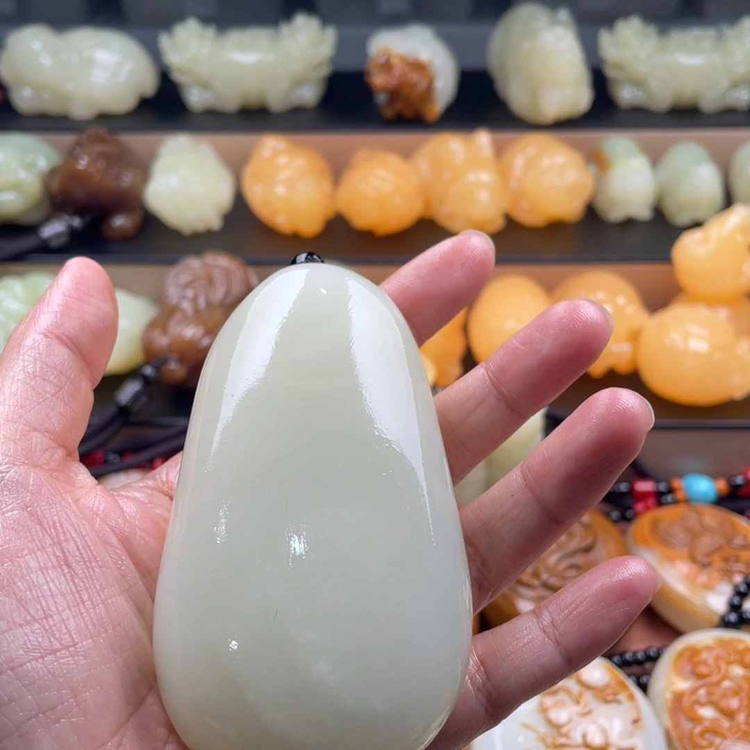 寒***热石材古青石手把件