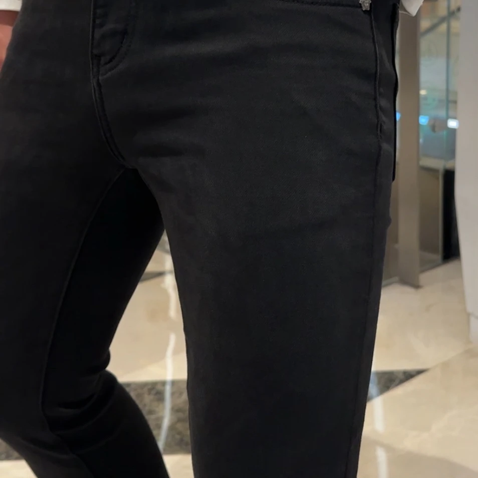 秋冬新款黑色男牛仔裤子休闲裤修身轻奢显瘦中腰小脚裤百搭