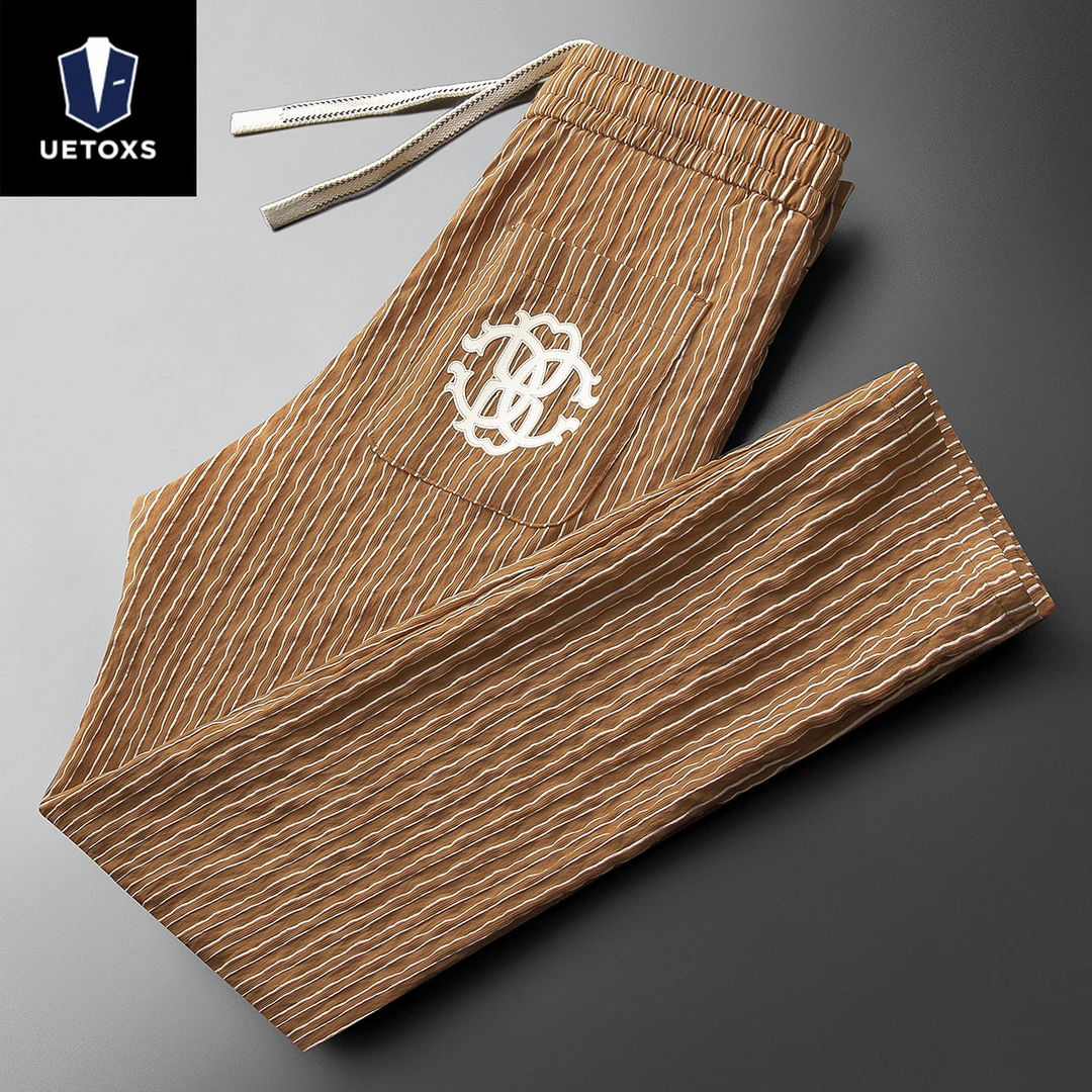 夏季高端时尚潮流英伦风竖条纹轻薄冰丝男士修身运动小直筒休闲裤