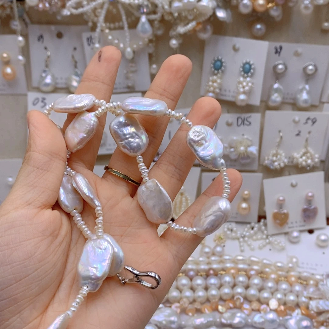 银S925镶嵌淡水珍珠耳饰小****?