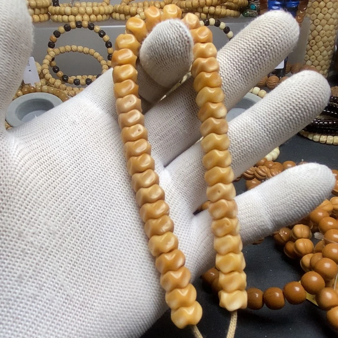 菩提根/象牙果把件龙脊菩提龙骨手持原生态带月