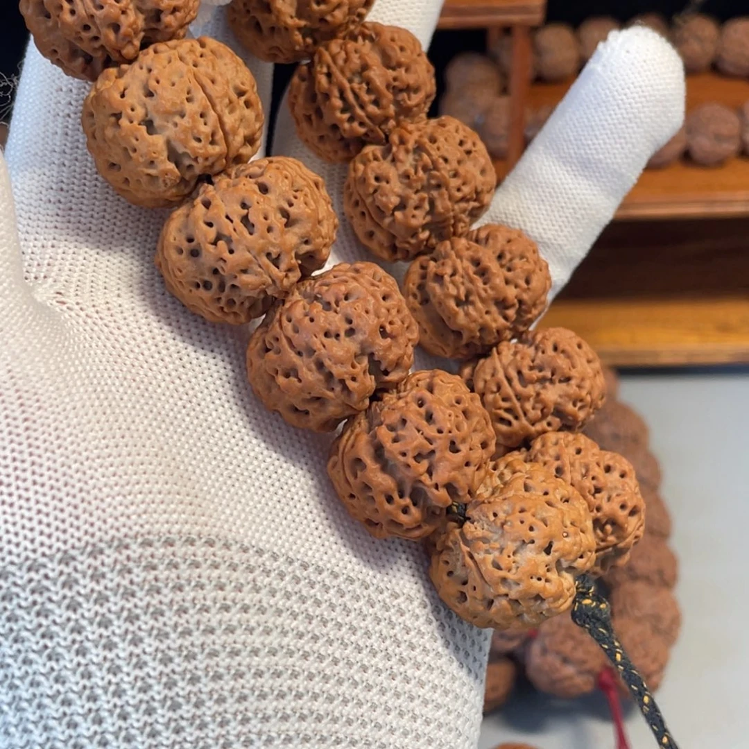 黑***）金刚菩提手串飞碟梅花