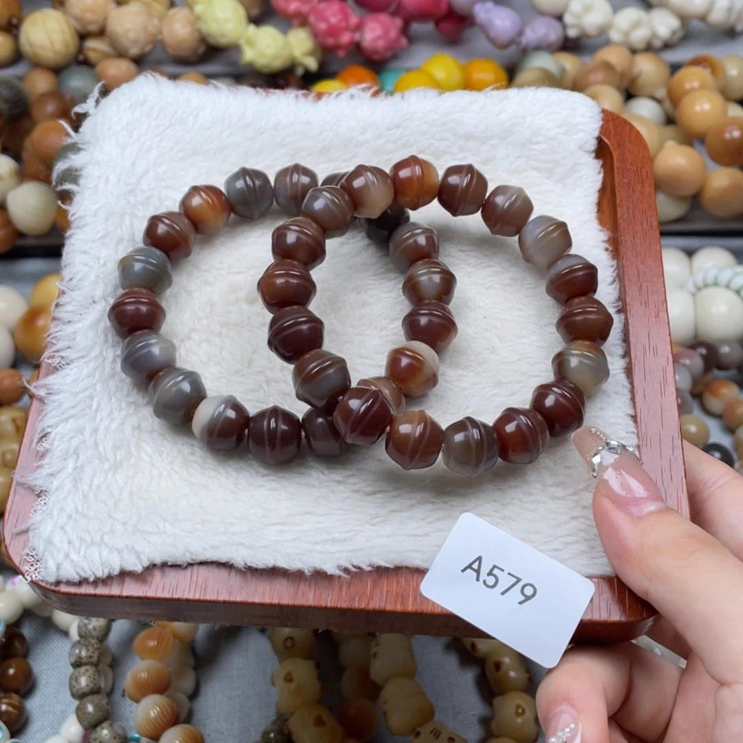 菩提根/象牙果手串瑕A579蜜罐12mm一串随机