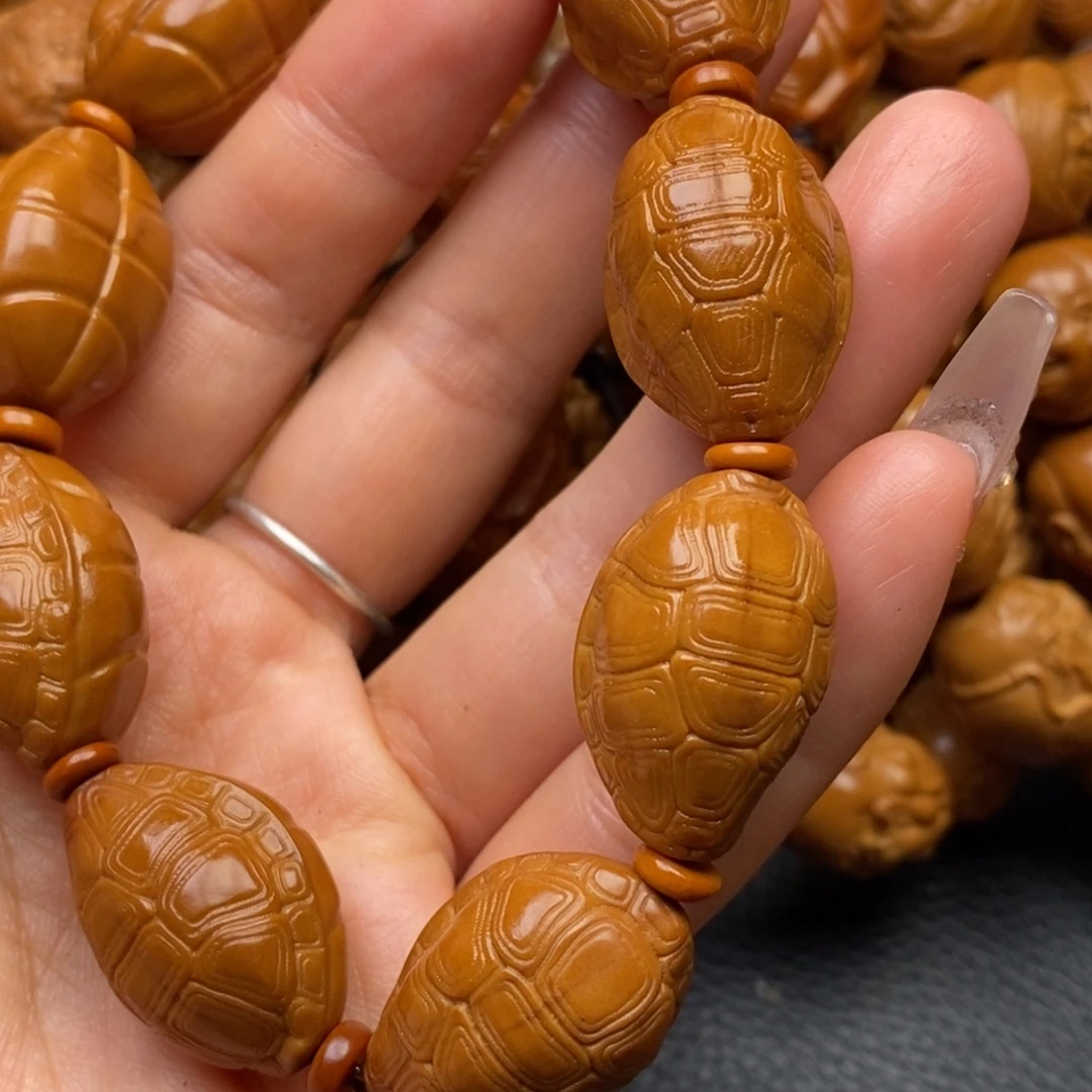 橄榄核吊坠富甲天下