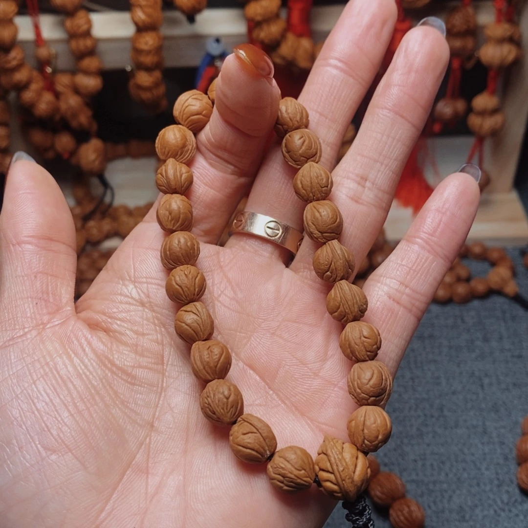 酱***悦桃核吊坠龙纹桃枭